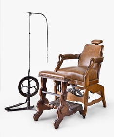 A late 19th century Archer patent barber or dentists chair with foot rest and drill