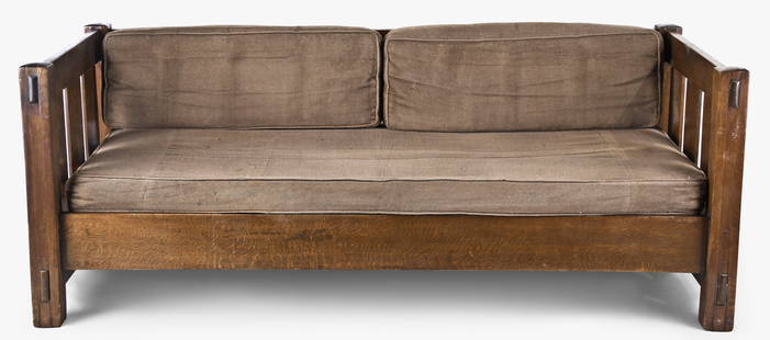 An early 20th century quarter sawn oak No. 208 settle attributed to Gustav Stickley: Attributed to Gustav Stickley, Syracuse, N.Y., an early 20th century quarter sawn oak No. 208 settle, all horizontal members with through tenons at the legs, the back with eight vertical slats, the si