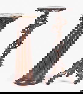 A lot of two early - mid 20th century display pedestals: 2 (Two) early - mid 20th century display pedestals, the first a tapered hardwood column with narrow, widely spaced flutes on a molded base, the top with carved Corinthian capital and conforming onyx s