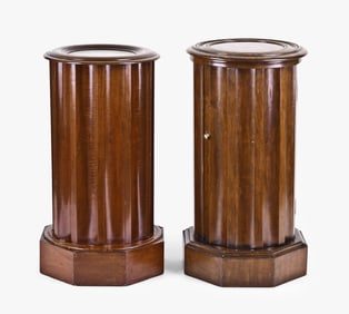 A lot of two similar mahogany fluted column form pedestal cabinets