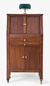 An early 20th century mahogany opthalmologists cabinet with contents