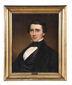 A 19th century American School oil on canvas portrait of a young man