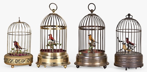 Four singing bird cages