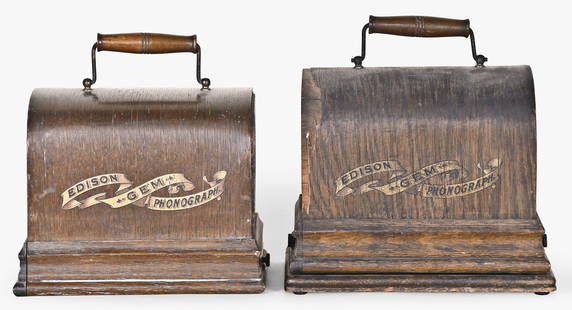 A lot of two Edison Gem model phonographs: 2 (Two) Thomas A. Edison, E. Orange, New Jersey,. "Gem" phonographs in oak cases, playing two minute wax cylinders, serial #'s G42475 & G125800