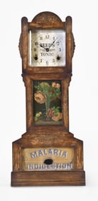 A Yale Clock Co. Reed's tonic miniature grandfather advertising clock