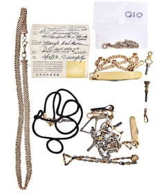 A lot of watch keys and chains including one in 14 karat gold