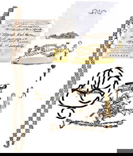A lot of watch keys and chains including one in 14 karat gold: A lot of watch keys and chains, including one decorative key with red stone, the chains gold filled and plated, in various styles, and one small curb link chain in 14 karat gold, 6.3g TW, together wit