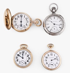 A lot of four American pocket watches including a Waltham 23 jewel bridge model 1899