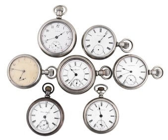 A lot of seven 18 size American pocket watches
