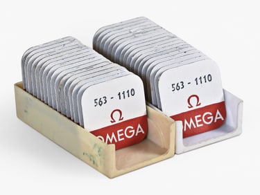 A lot of NOS watch material for the Omega cal. 560, 563, 750 and 1000 movements