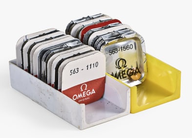 A lot of NOS watch material for the Omega cal. 550, 560 and 563 movements