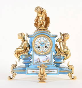 French Sevres type porcelain and bronze mantel clock: French, porcelain and bronze figural mantel clock with Sevres type porcelain painted panels, multicolor enamel dial, eight day time and strike, spring driven brass movement stamped with no. 141c 4.8