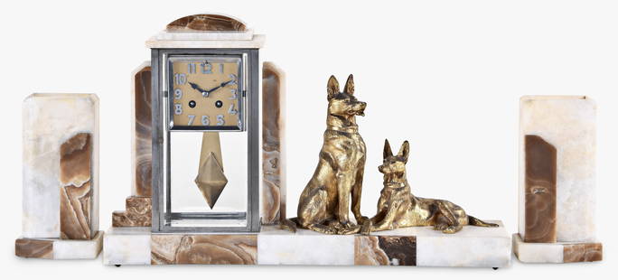 A French three piece mantel clock garniture: France, three piece mantel clock garniture in an Art Deco case with matching tazze, made of white onyx and brown variegated roseate marble with two large cast brass German Shepard dog figures, brass t