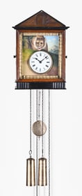 A Black Forest Augenwender moving eyes cuckoo clock