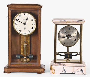 Two electromechanical battery operated mantel clocks: 2 (Two) electromechanicals mantel clocks: (1) a La Societe Bulle et Cie, France, marble and glass case, silvered brass dial , spade and pointer hands, battery brass movement; (2) an ATO in a wood case