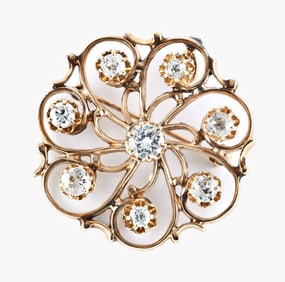 A good 20th century diamond set 14 karat gold brooch