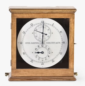 An interesting electric timepiece with Ferraris motor and astronomical dial signed Anton Baronek