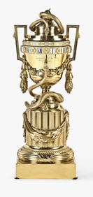 A late 19th century Louis XV style urn form pendule a cercle tournant signed Lepaute