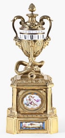 A good mid 19th century French urn form pendule a cercle tournant signed Farret
