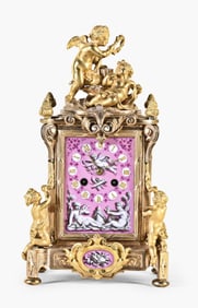 A good late 19th century French gilt bronze table clock with Sevres style panels