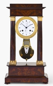 A good early 19th century mahogany portico clock signed Lepine