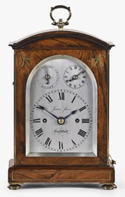 A mid 19th century rosewood table or mantel clock by James Steer Guildford