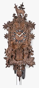 A late 19th century hanging carved trumpeter clock with eight wooden pipes by Emilian Wehrle