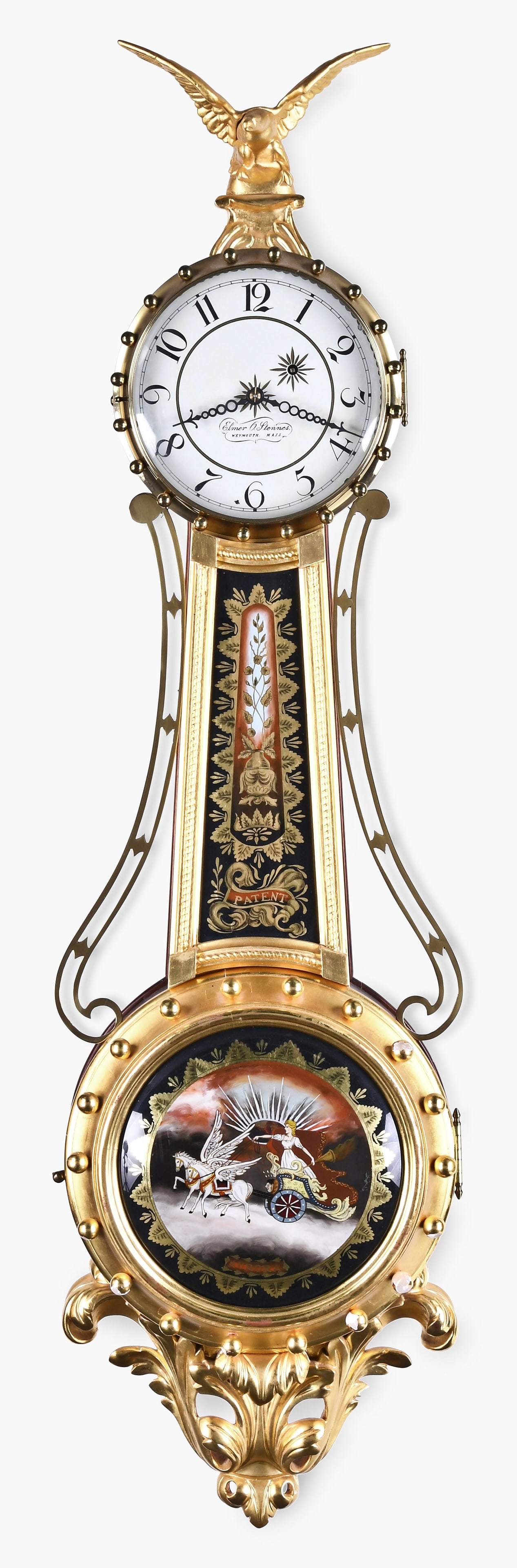 An Elmer Stennes girandole wall: Elmer Stennes, Weymouth, Mass., a girandole wall clock with mahogany and gilt case, painted metal dial with Curtis type hands, eight day weight driven brass movement, case stamped "50" & "73"
