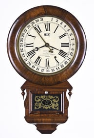 An Ansonia Brass & Copper Co. Drop Extra Calendar wall clock