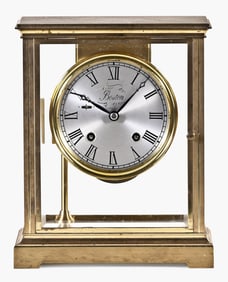 A Boston Clock Co. crystal regulator mantel clock
