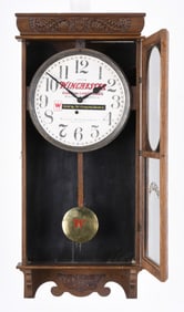 An E. Ingraham & Co. hanging advertising clock with dial for Winchester Repeating Arms Co.