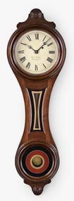 A Wayne Cline reproduction of a Howard No. 10 figure eight hanging clock