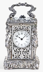 A miniature French silver carriage clock