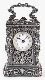 A miniature French silver carriage clock