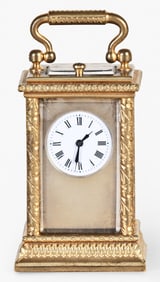 An early 20th century Swiss miniature hour repeating carriage clock
