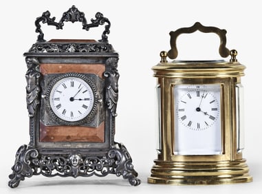 A lot of two miniature carriage clocks including an oval mignonette No. 1