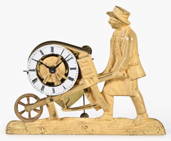 A rare early 19th century French or Austrian figural miniature timepiece