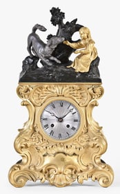 A French gilt brass figural mantel clock