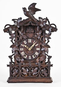 A Black Forest shelf cuckoo clock