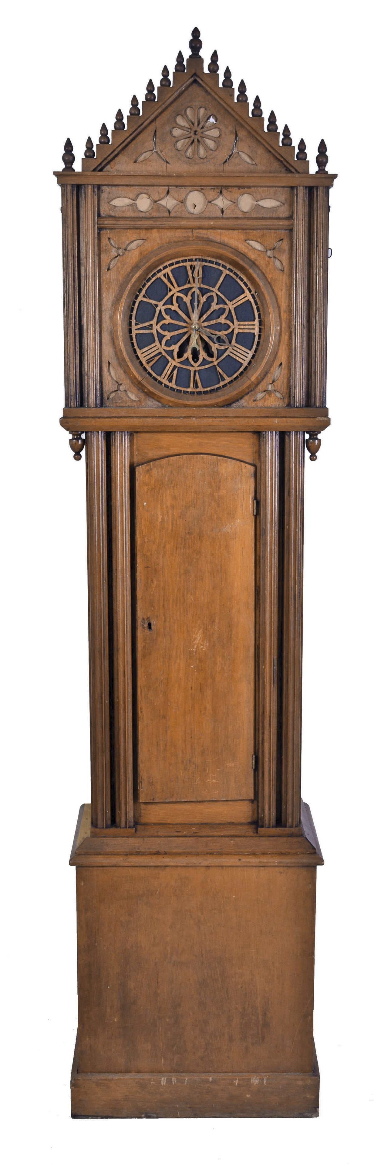 A large mid 19th century Black Forest longcase organ clock with American case: Germany and America, a large mid 19th century Black Forest organ clock, the gothic style pine case with base having quarter round and bevel moldings, trunk with pairs of fluted columns flanking a rect