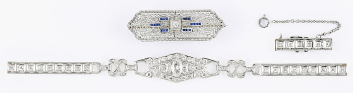 Two pieces of early 20th century diamond set gold and platinum jewelry