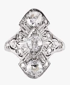 A good early 20th century diamond and platinum ring