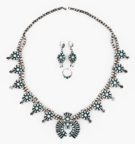 A 20th century silver and turquoise squash blossom necklace and earrings