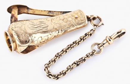 A late 19th century engraved 14 karat gold cigar cutter