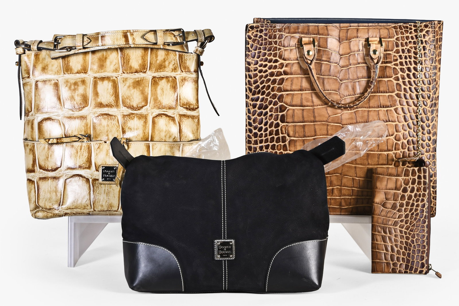 A lot of three late 20th - early 21st century Dooney & Bourke bags (1 of 2)
