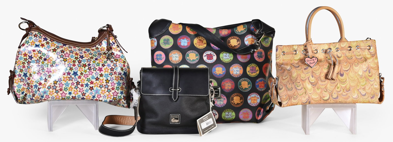 A lot of four late 20th - early 21st century Dooney & Bourke bags (1 of 2)