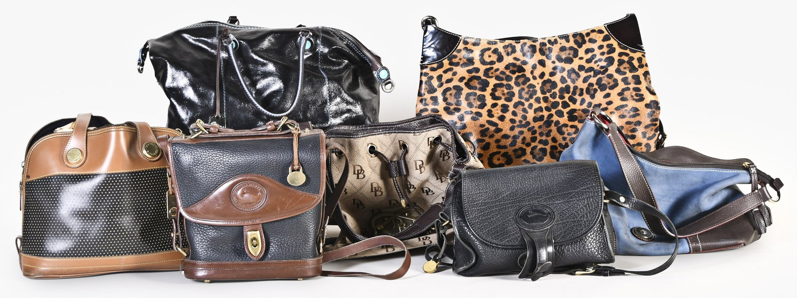 A lot of seven late 20th - early 21st century Dooney & Bourke bags (1 of 2)