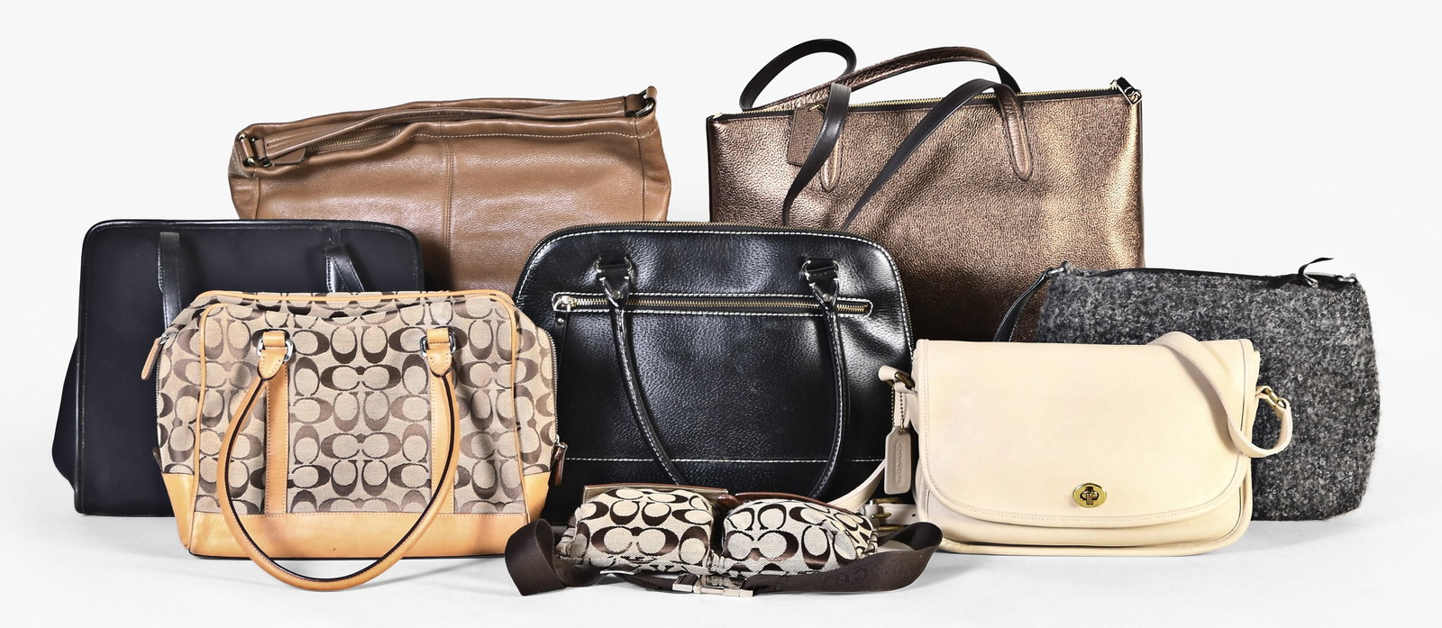 A lot of eight bags by Coach and Kate Spade: 8 (Eight) bags by Coach and Kate Spade, Coach items include a fanny pack, a small black tote style purse, a white flap bag, a tan leather bag, a copper colored leather zip top tote, and a duffel style
