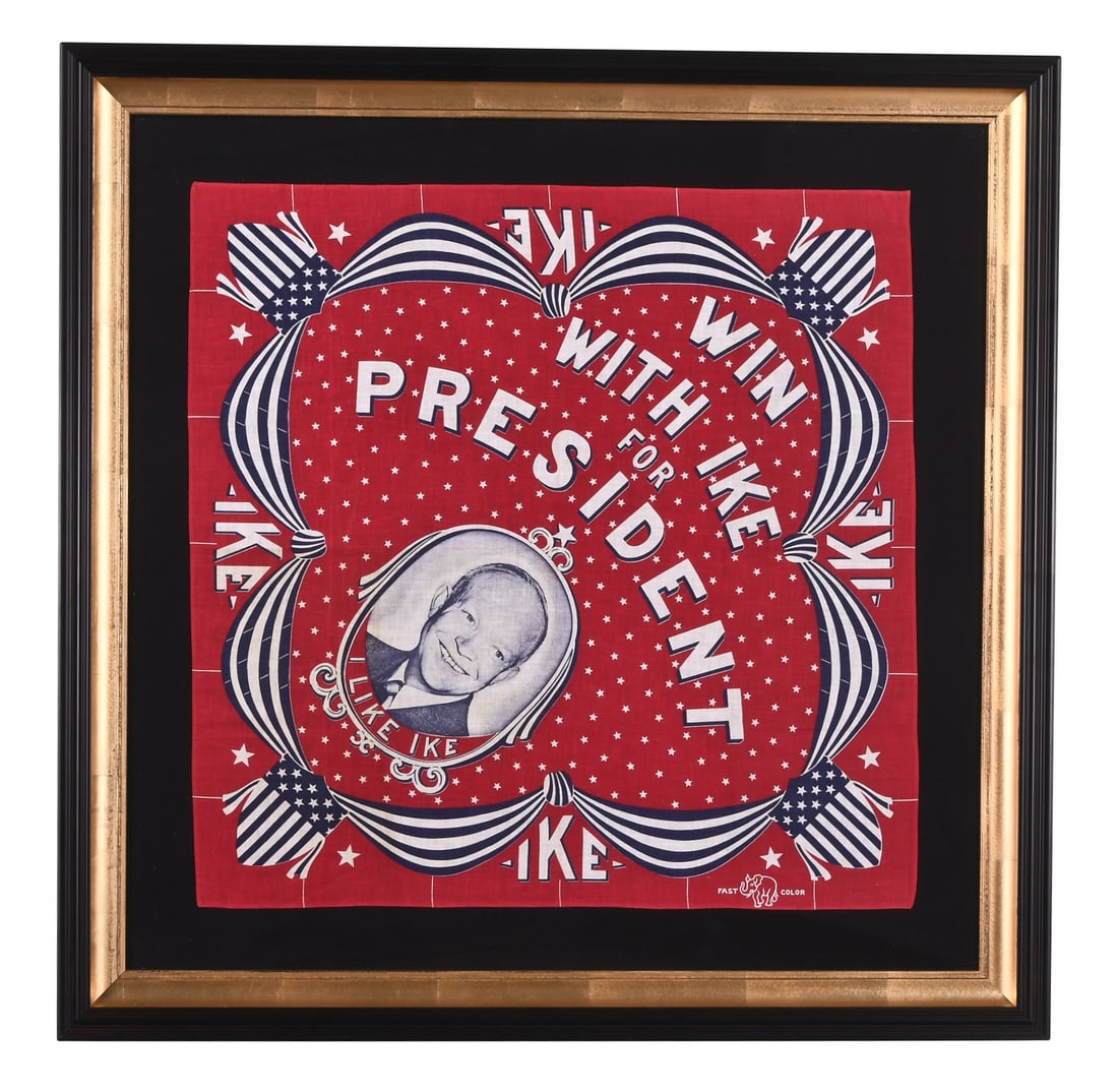 A Dwight D. Eisenhower campaign scarf from the 1952 presidential election: A Dwight D. Eisenhower campaign scarf from the 1952 presidential election, red dyed cotton with blue and white bunting and shield border arranged as a quatrefoil and surrounding a field with stars and