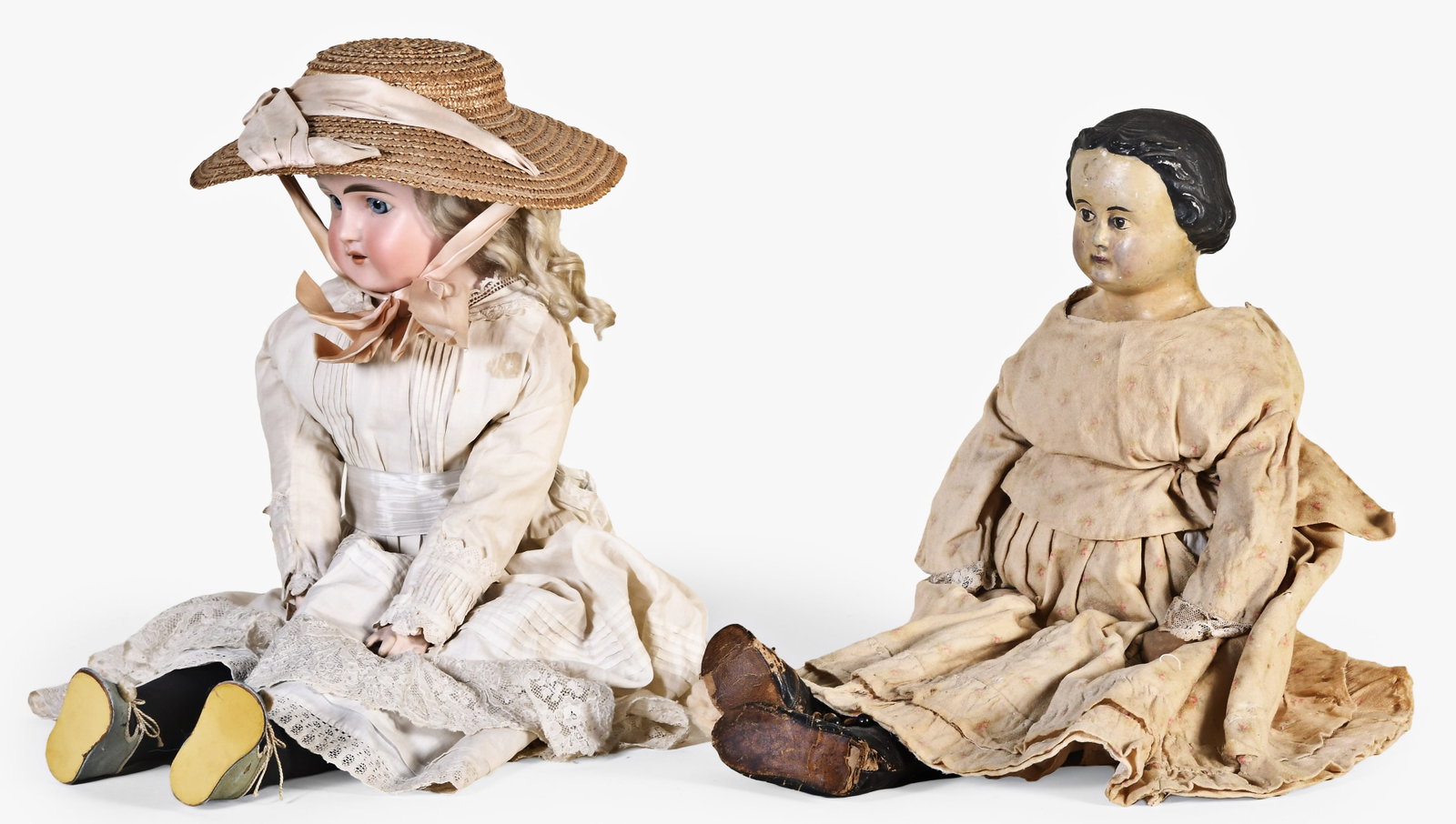 A lot of two 19th and early 20th century dolls, one possibly by Ludwig Greiner: 2 (Two) 19th and early 20th century dolls, the first 24 inches tall and possibly by Ludwig Greiner, with papier mache shoulder plate head having black painted hair and brown painted eyes, cloth body, 